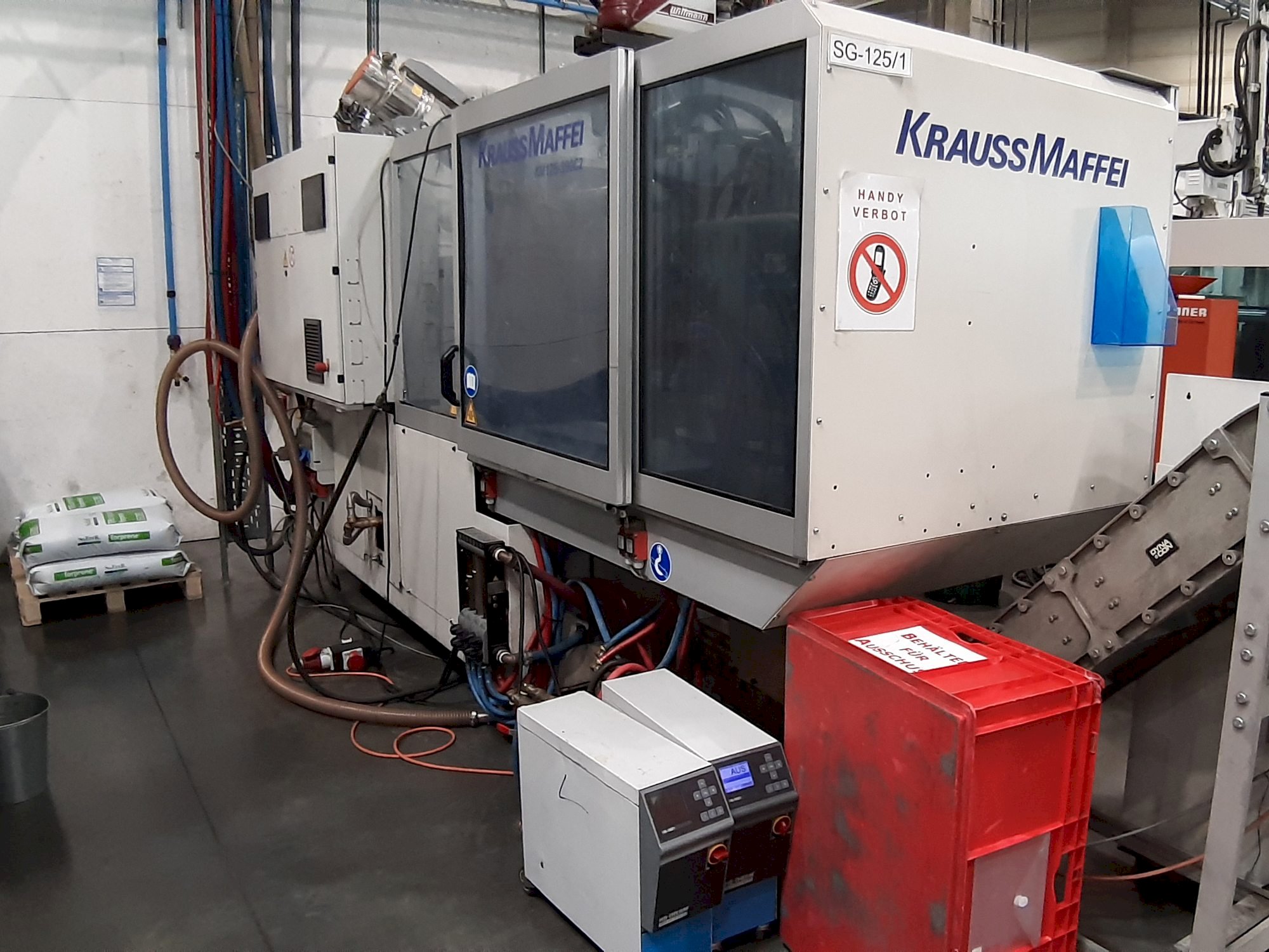 Makine  Krauss Maffei 125 - 390 CX - Önden görünüm