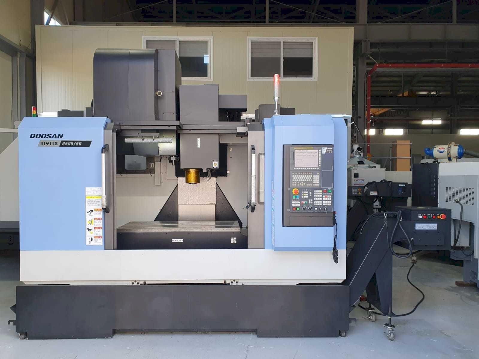 Makine  Doosan Mynx 6500/50 - Önden görünüm